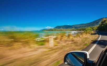 Road trip with motion blur along Ellis Beach near Palm Cove and Cairns, Australia