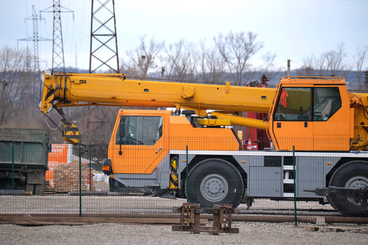 Heavy duty mobile lifting crane at construction site.