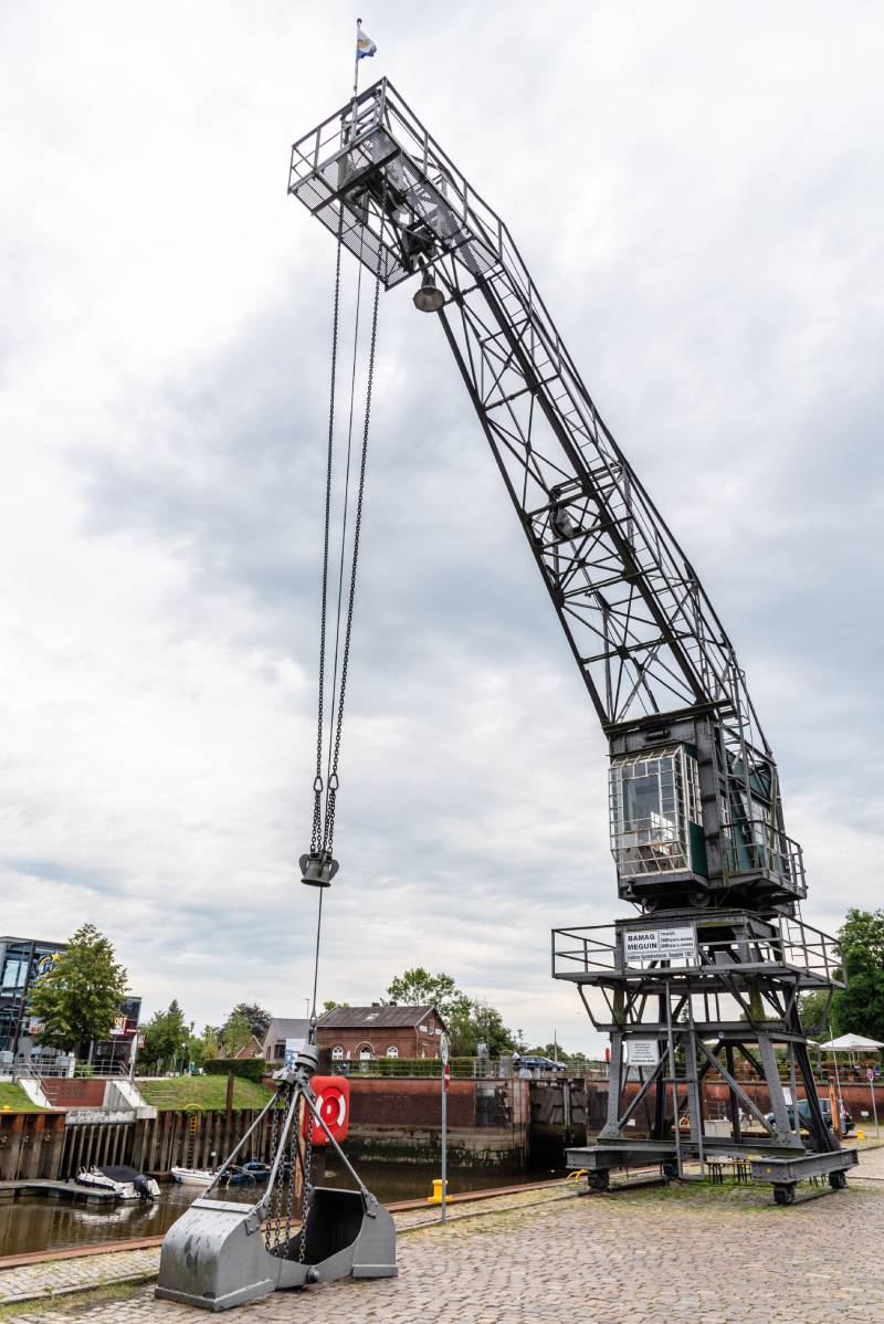 Stade, Germany - August 5, 2019: Old crane in the harbour of Stade