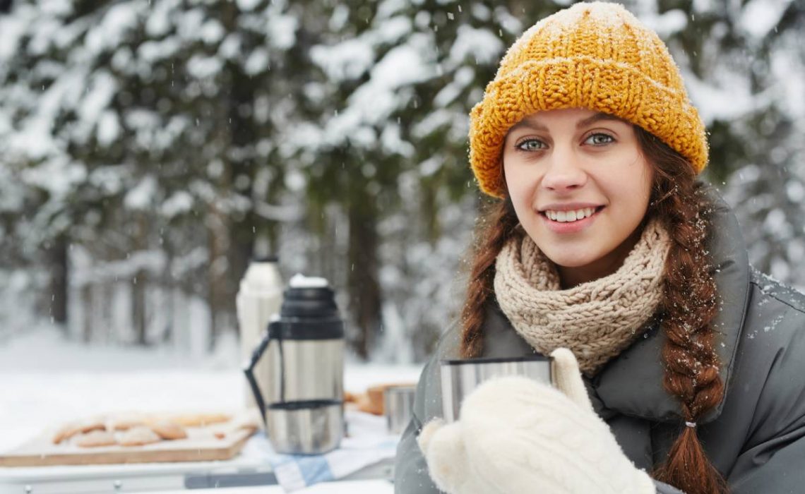 smiling-attractive-girl-drinking-from-thermos-mug-2023-11-27-05-05-28-utc (1)