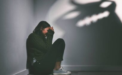 shot-of-a-young-woman-sitting-in-the-corner-of-a-d-2025-04-06-01-48-15-utc (1)